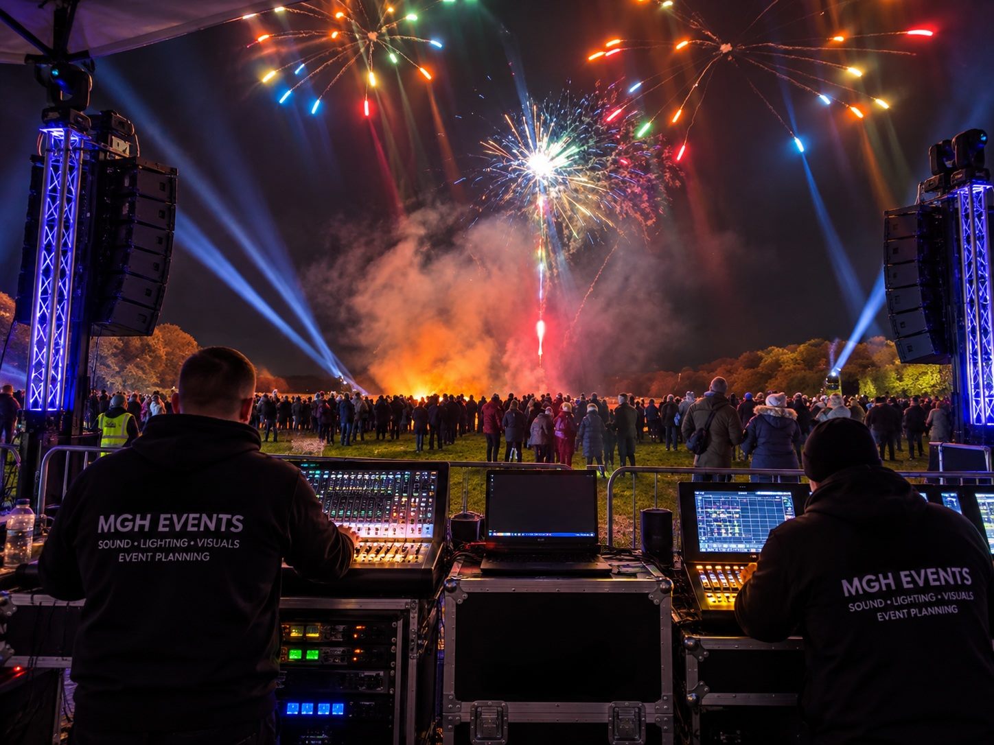 MGH Events crew running sound and lighting desks at an outdoor firework display